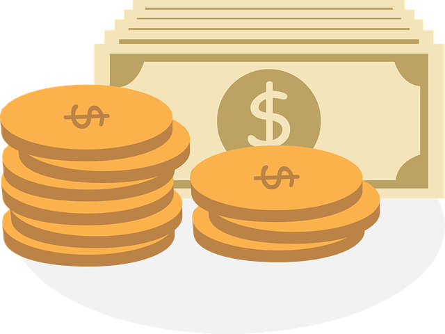 A stay of yellow coins in front of several yellow cash bills with dollard signs on them. A pile of money.